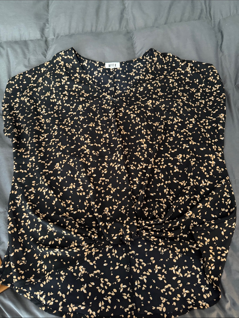 Black Blouse with Beige Floral Print and Front Twist Detail